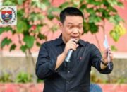 Pengaspalan jalan hingga pembangunan rabat beton diumumkan Bupati Oloan Nababan saat peletakan batu pertama KDMP Mungkur.